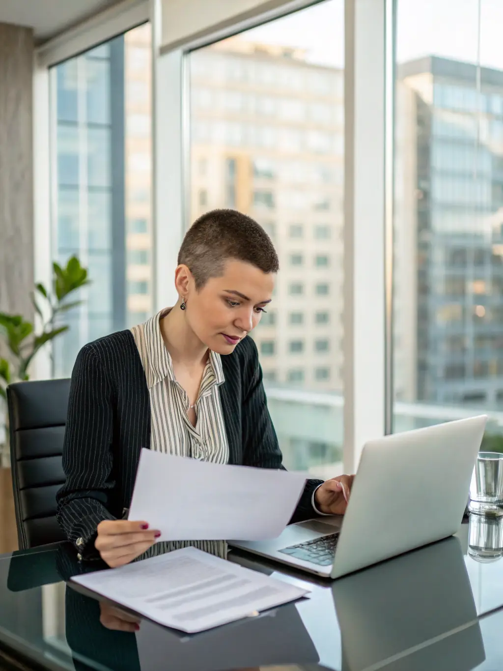 An image depicting a small business owner reviewing loan options on the Squarespace platform, showcasing the accessibility of financial support for business growth.